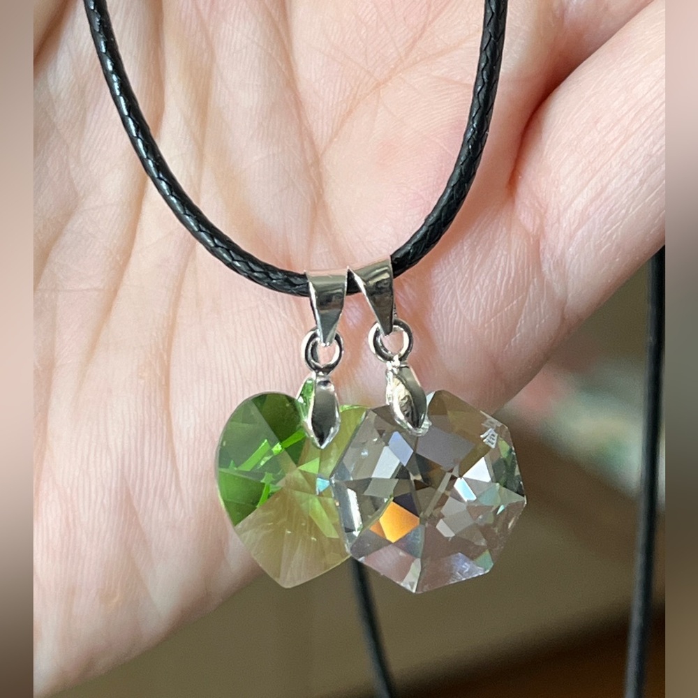Dual Swarovski crystal pendants on black cord necklace